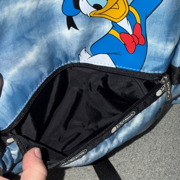 Disney Pals Bring Fun to Fashion with LeSportsac LeSportsac Small Carrier Backpack with Donald Duck “lookout Donald”